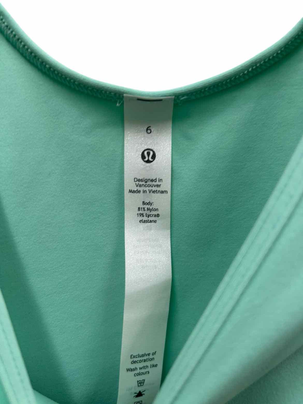 Lulu Lemon Size 4/6 Aqua T-shirt